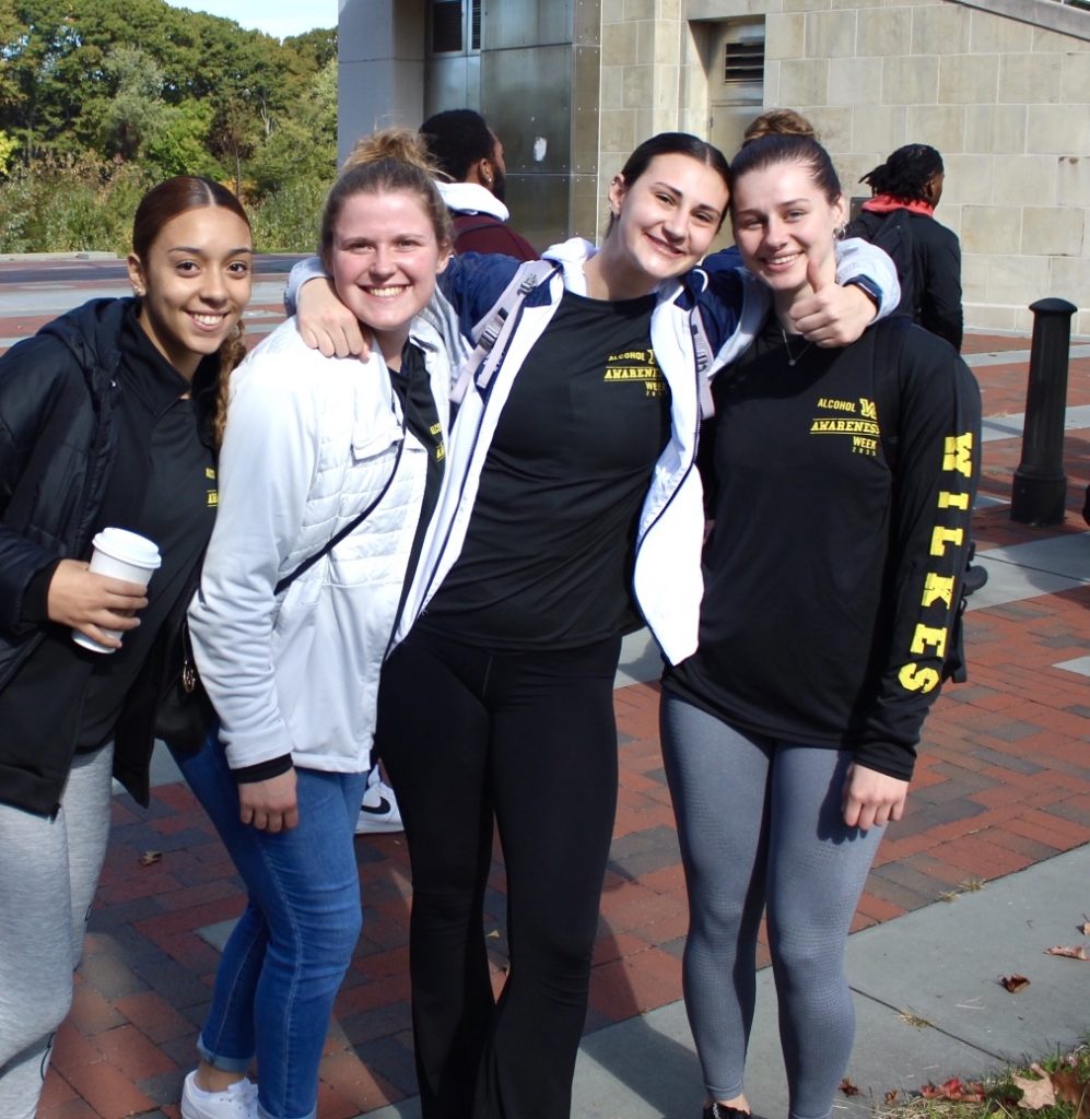 Wilkes students posing at the Riverfront