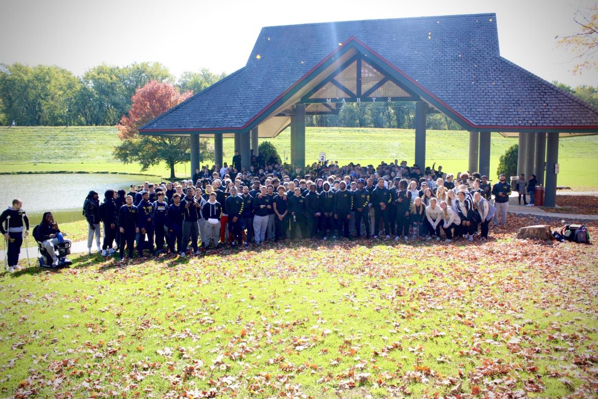 group of students gathered at Kirby Park pavillion