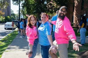 Picture of Wilkes staff members displaying their work on move in day