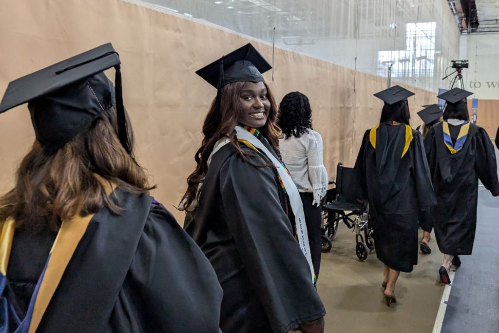 Summer graduates walk at commencement