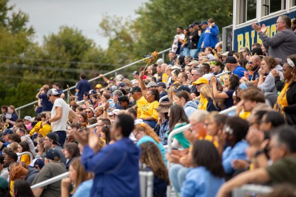 picture of wilkes crowd cheering football team at homecoming