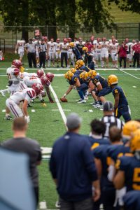 football teams facing off during the homecoming game