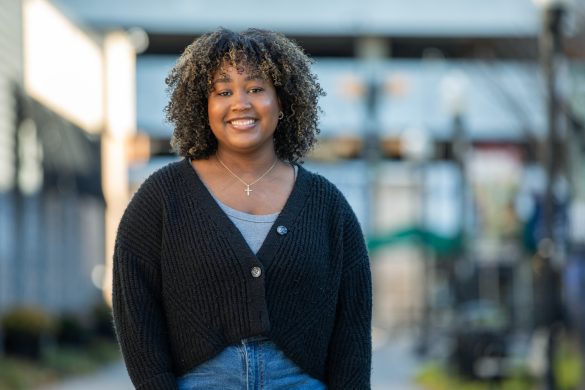 Photo of Brenda Arias on the campus gateway