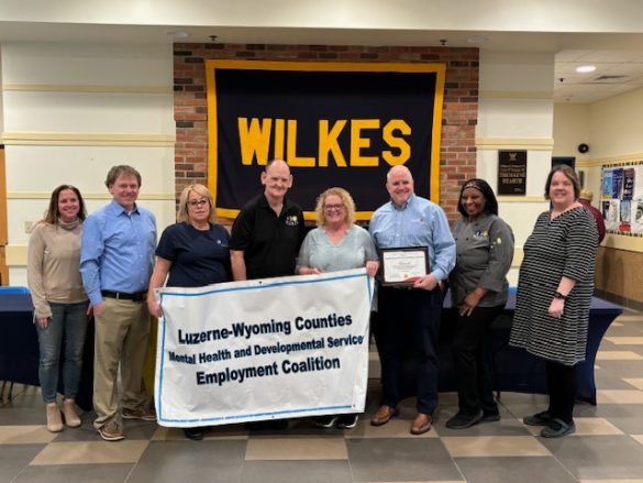 Group gathers to award certificates of appreciation to Aramark and Wilkes